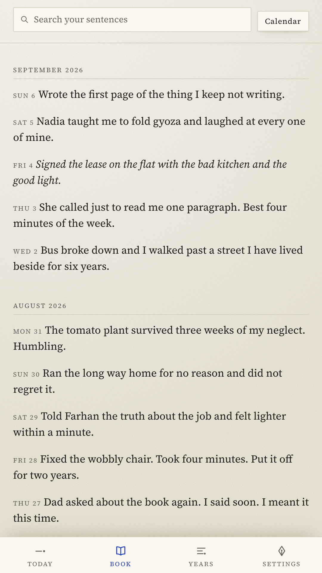 The Book screen: a continuous typeset scroll of past sentences under month headings.